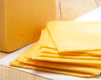 Saputo Ribbon Sliced Yellow Cheese 2x2kg